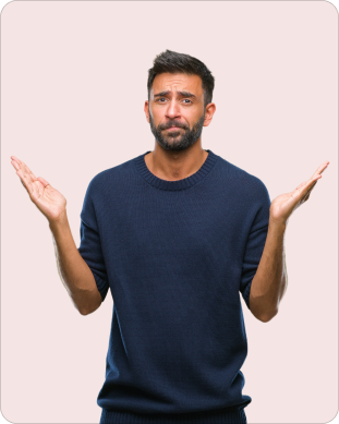 Man in a navy sweater shrugging with both palms raised