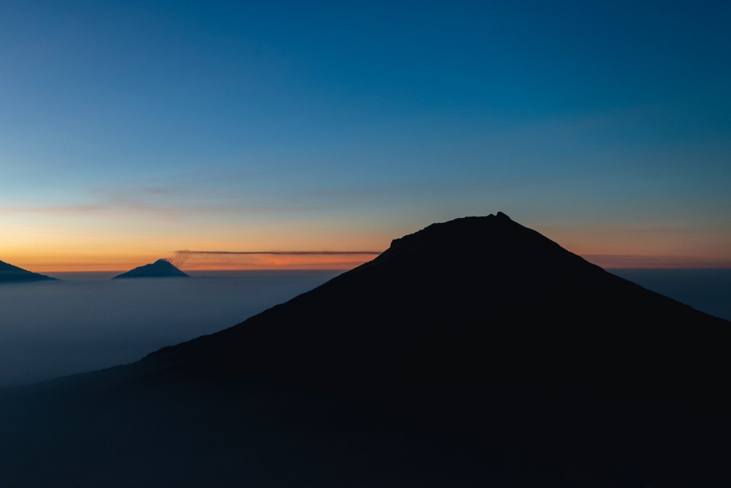 A mountain silhouette at dusk